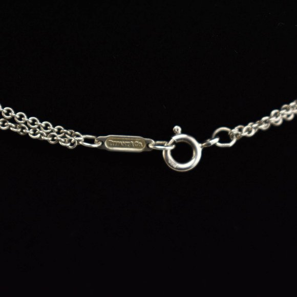 TIFFANY & CO: Sterling Silver "Infinity" Necklace - Picture 4 of 6